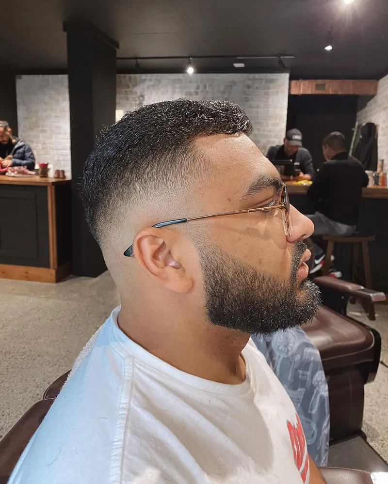 Mid fade, beard trim