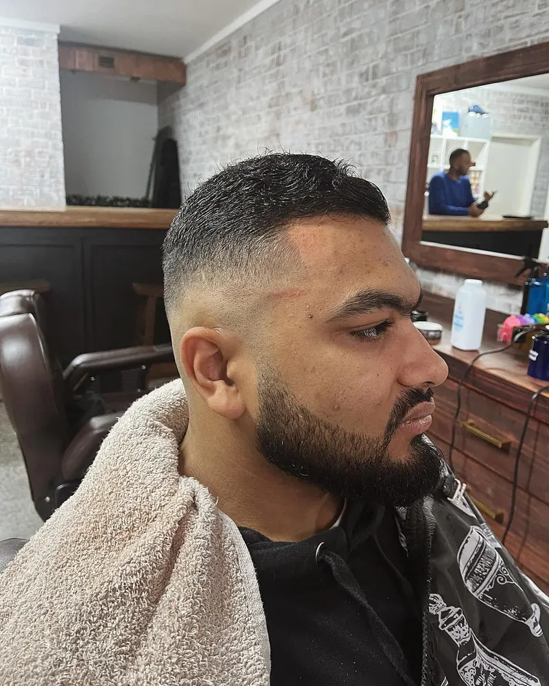 Low skin fade, full beard